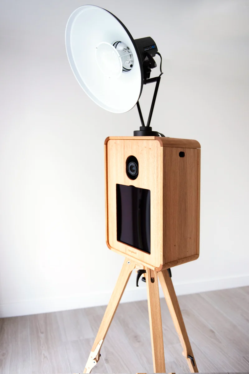The Icon Booth’s camera, front touchscreen and studio light in its oak housing.